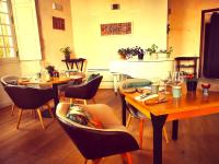 Posezení v ubytování Le logis de l'abbaye de Saint Savin