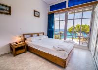 Posteľ alebo postele v izbe v ubytovaní Theodora Apartments