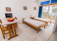 Posteľ alebo postele v izbe v ubytovaní Theodora Apartments