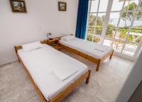 Posteľ alebo postele v izbe v ubytovaní Theodora Apartments