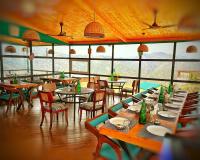 Restaurace v ubytování Cottages by AMALA