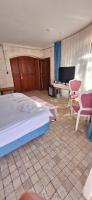 Postel nebo postele na pokoji v ubytování Hillcity Hotel
