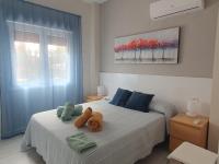 A bed or beds in a room at Apartamento en Urbanizacion El Retiro III