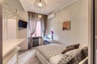 Postel nebo postele na pokoji v ubytování Lux Apartment