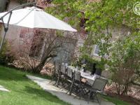 Ogród w obiekcie Gîte familial avec sauna, jacuzzi, jardin clos et équipements complets à Neulise - FR-1-496-260