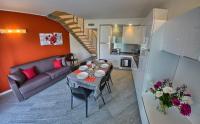 Posedenie v ubytovaní Rainbow Holiday Apartments Lake Como