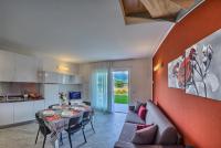 Kuchyňa alebo kuchynka v ubytovaní Rainbow Holiday Apartments Lake Como