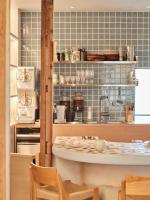 a kitchen with a table and chairs in a room at Tipy records inn nook in Odawara