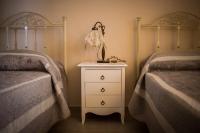 A bed or beds in a room at Residenze nei Trulli