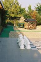 a chess board with white vases on it at Hotel Gasthof Goldener Hahn in Frankfurt Oder