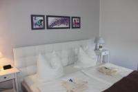 Postel nebo postele na pokoji v ubytování Weber Apartments