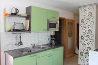Kuchyň nebo kuchyňský kout v ubytování Weber Apartments