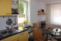 Kuchyň nebo kuchyňský kout v ubytování Weber Apartments