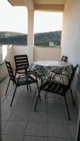 Posezení v ubytování Apartment Lopar