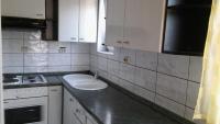 Kuchyň nebo kuchyňský kout v ubytování Apartment Lopar
