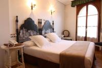 Postel nebo postele na pokoji v ubytování Hotel Merindad de Olite