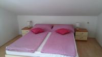 Postel nebo postele na pokoji v ubytování Apartment Lopar
