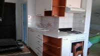 Kuchyň nebo kuchyňský kout v ubytování Apartment Lopar