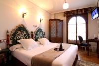 Postel nebo postele na pokoji v ubytování Hotel Merindad de Olite