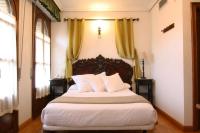 Postel nebo postele na pokoji v ubytování Hotel Merindad de Olite