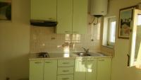 Kuchyň nebo kuchyňský kout v ubytování Apartment Lopar