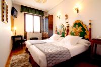 Postel nebo postele na pokoji v ubytování Hotel Merindad de Olite