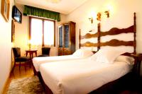 Postel nebo postele na pokoji v ubytování Hotel Merindad de Olite