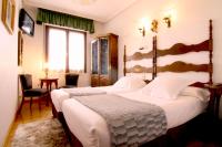 Postel nebo postele na pokoji v ubytování Hotel Merindad de Olite