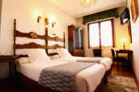 Postel nebo postele na pokoji v ubytování Hotel Merindad de Olite