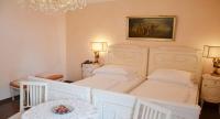 Posteľ alebo postele v izbe v ubytovaní Seehotel Porcia