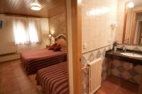 Postel nebo postele na pokoji v ubytování Hotel Sant Roc