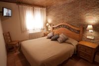 Postel nebo postele na pokoji v ubytování Hotel Sant Roc