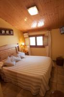 Postel nebo postele na pokoji v ubytování Hotel Sant Roc