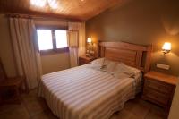 Postel nebo postele na pokoji v ubytování Hotel Sant Roc