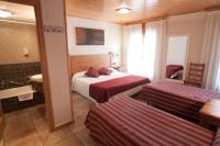 Postel nebo postele na pokoji v ubytování Hotel Sant Roc
