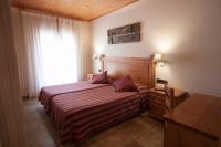 Postel nebo postele na pokoji v ubytování Hotel Sant Roc