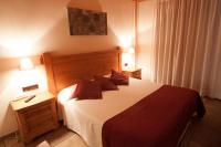 Postel nebo postele na pokoji v ubytování Hotel Sant Roc