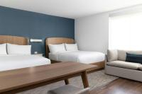 Ein Bett oder Betten in einem Zimmer der Unterkunft Element Las Vegas Airport