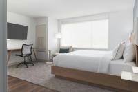 Ein Bett oder Betten in einem Zimmer der Unterkunft Element Las Vegas Airport
