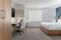 Ein Bett oder Betten in einem Zimmer der Unterkunft Element Las Vegas Airport