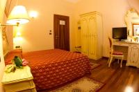 Postel nebo postele na pokoji v ubytování Locanda Poste Vecie
