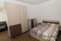Postel nebo postele na pokoji v ubytování Apartments in Lotos Complex