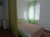 Postel nebo postele na pokoji v ubytování Apartments in Lotos Complex