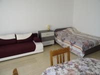 Postel nebo postele na pokoji v ubytování Apartments in Lotos Complex