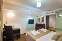 TV a/nebo společenská místnost v ubytování Amorgos Boutique Hotel
