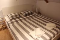 Postel nebo postele na pokoji v ubytování Dubrovnik Rupe Apartment