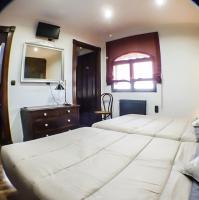 Posteľ alebo postele v izbe v ubytovaní Green Peaks B&B Country House Alojamiento Rural