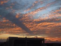 a cloudy sky at sunset with a building at JR Hotel in João Pessoa
