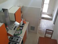A kitchen or kitchenette at La Rosa dei Sassi 2