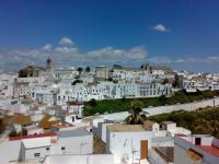 a view of a city with white buildings at Hotel Tugasa Convento San Francisco in Vejer de la Frontera